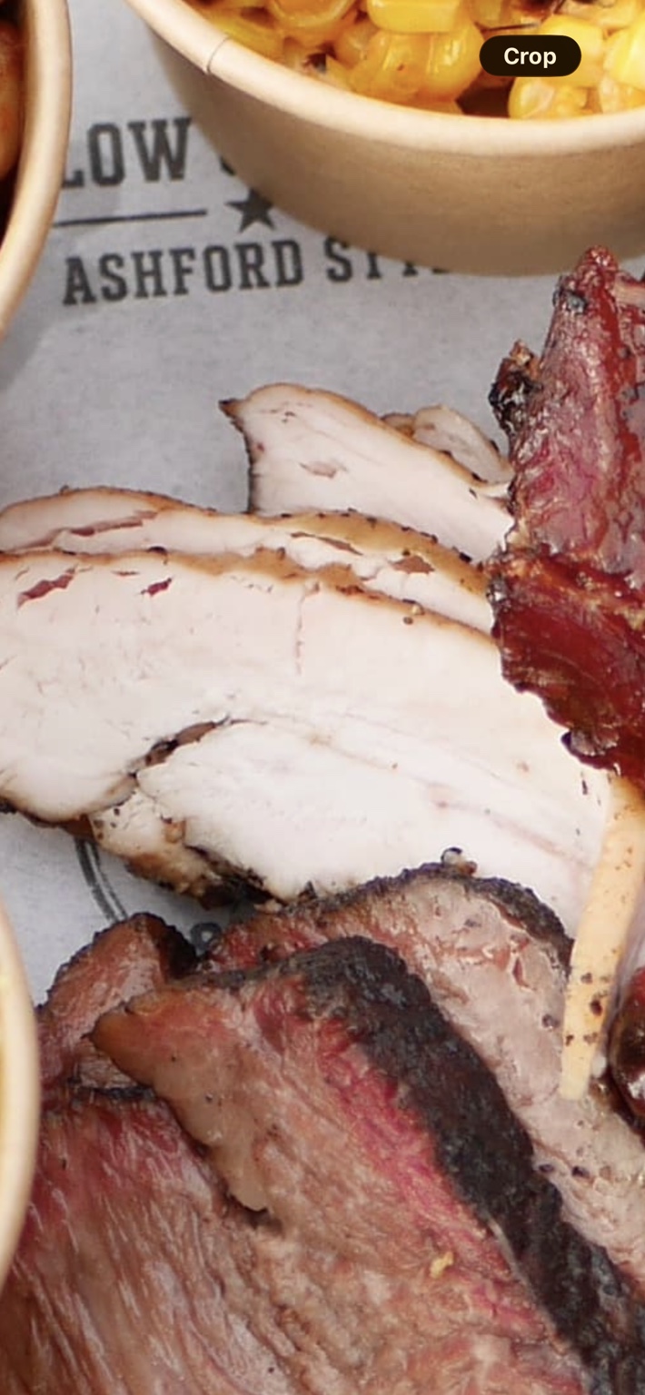 Our sliced smoked chicken breast on a BBQ tray